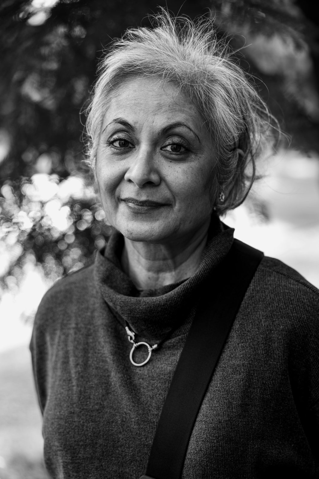 Black and white: portrait of a woman with short grey hair